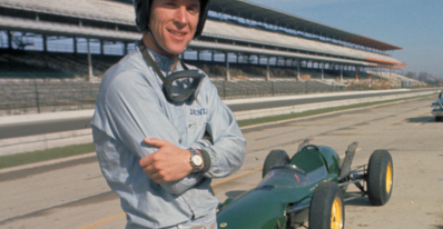 Dan Gurney poses with the Lotus 29.