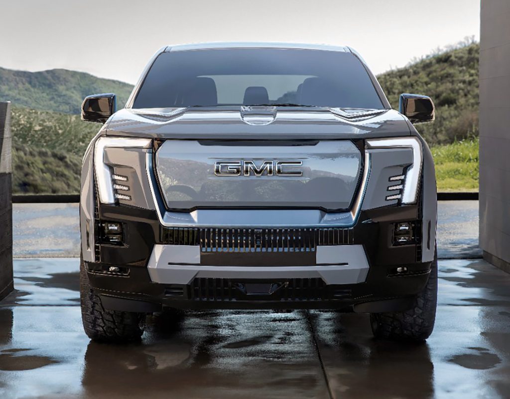 Bold and modern grille of the GMC Sierra EV Denali Edition 1 from a front view.