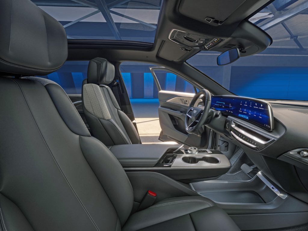 Interior shot of the full dash and center console in the 2024 Cadillac LYRIQ Tech trim.