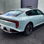 Rear 3/4 view, parked