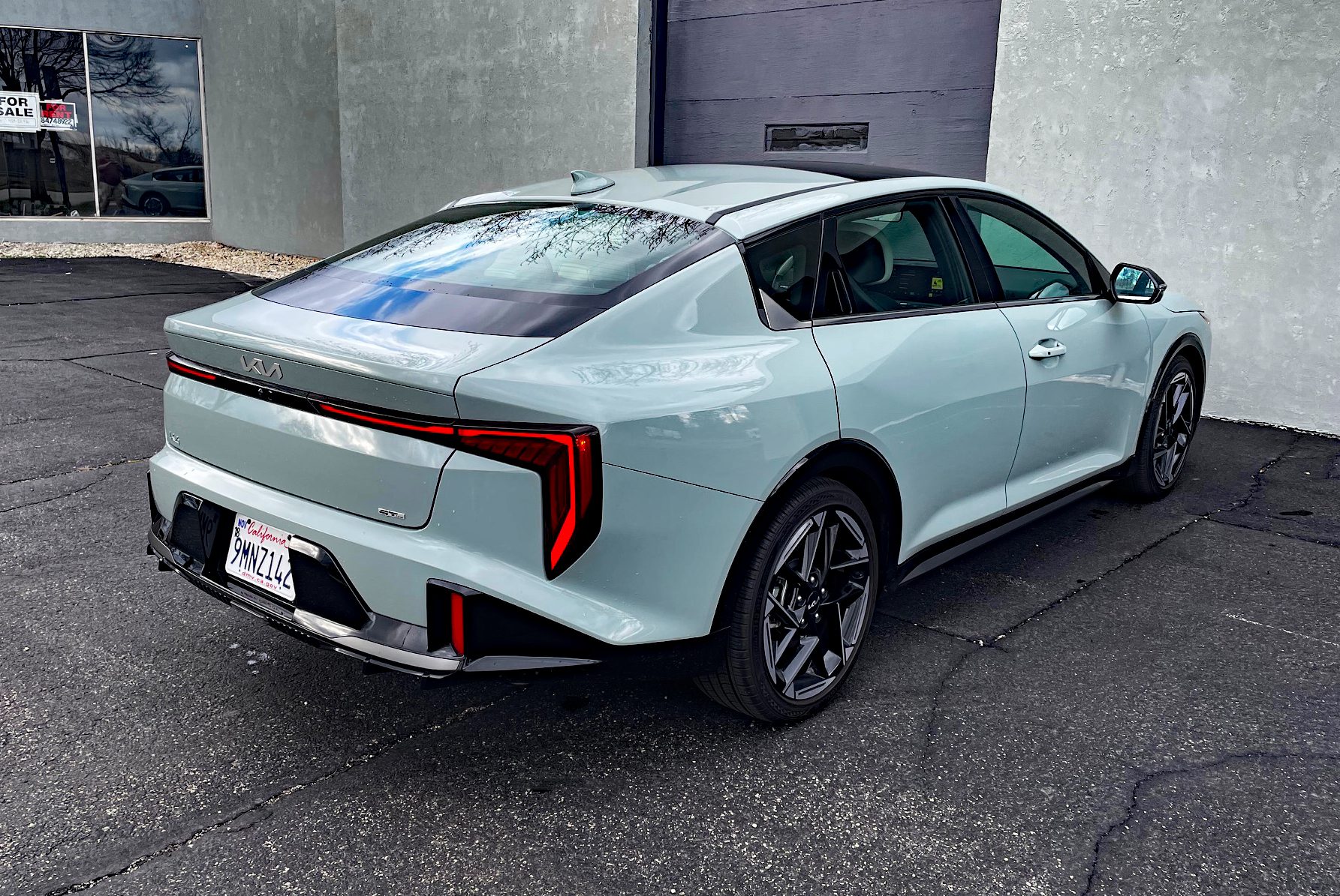 Rear 3/4 view, parked