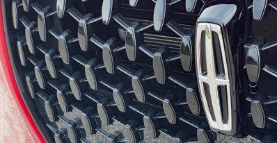 2025 Lincoln Corsair Grand Touring in Red Carpet Metallic with Jet Package, grille detail