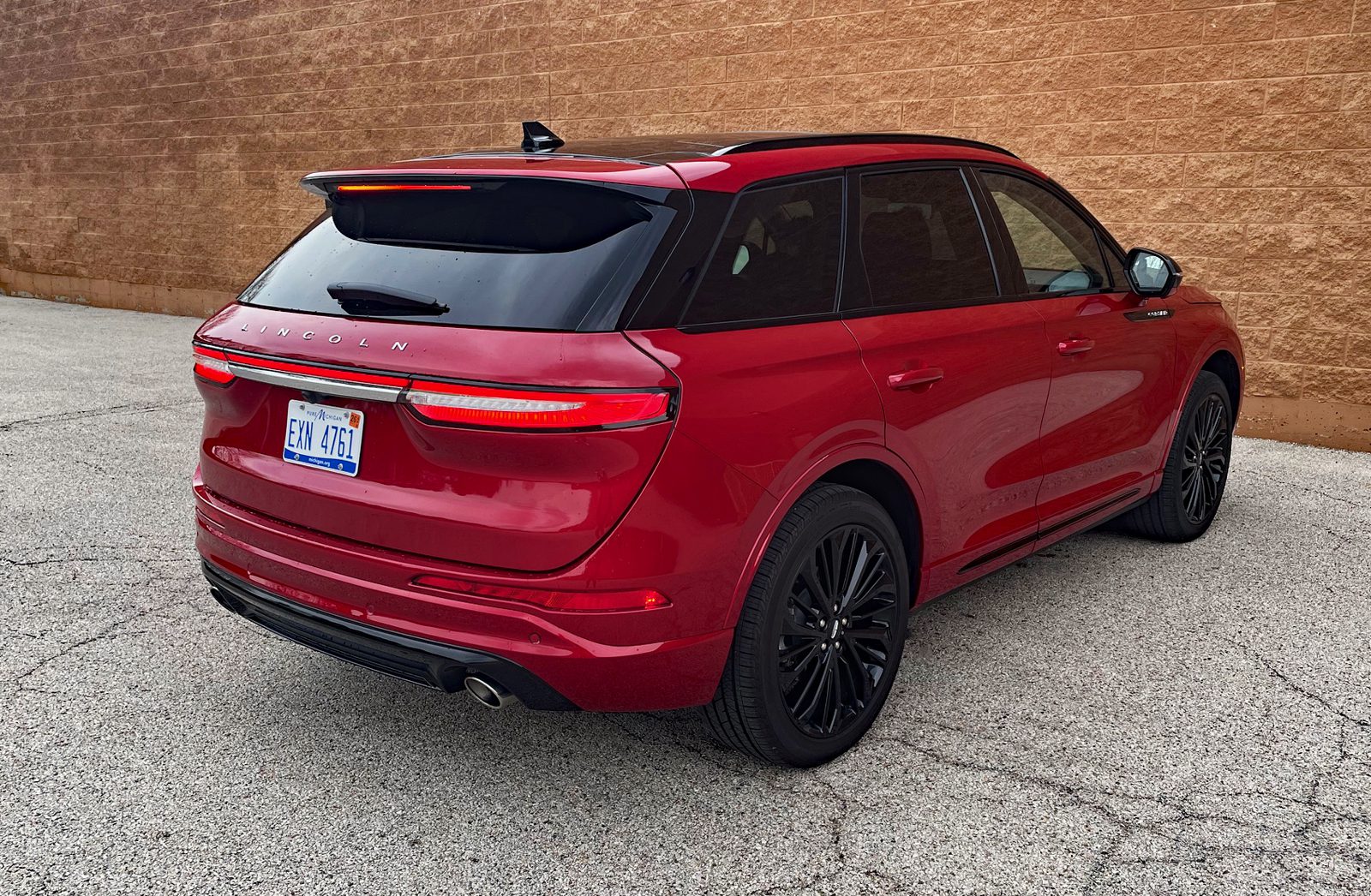 2025 Lincoln Corsair Grand Touring in Red Carpet Metallic with Jet Package, rear 3/4 view