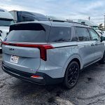 2025 Kia Carnival Hybrid SX Prestige rear 3/4 view