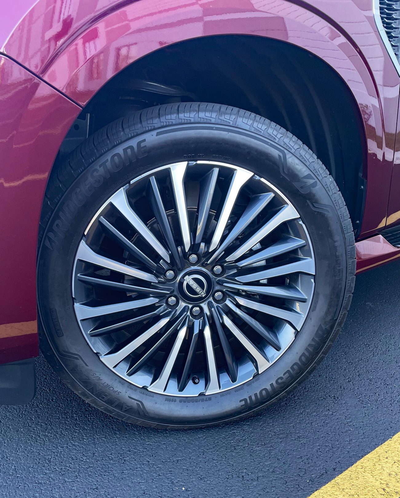 2025 Nissan Armada Platinum Reserve in Coulis Red, wheels