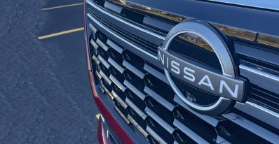 2025 Nissan Armada Platinum Reserve in Coulis Red, grille detail