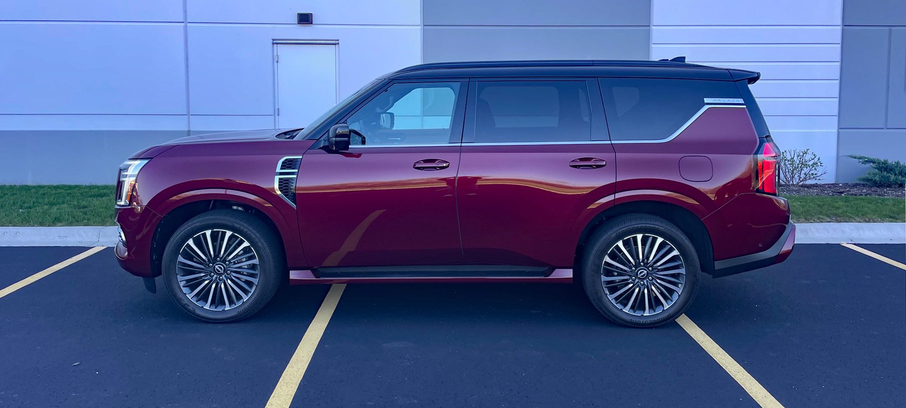 Nissan Armada Platinum Reserve in Coulis Red, profile