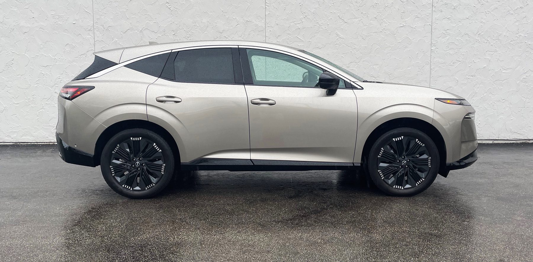 2025 Nissan Murano Platinum in Champagne Silver, profile, rain,