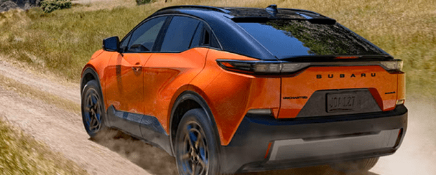 2026 Subaru Uncharted, Orange, rear view, gravel