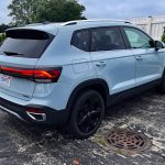 2025 Volkswagen Taos SEL, gray, rear 3/4 view