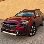 2025 Subaru Outback Touring XT, Crimson Red, front 3/4 view Pearl