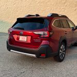 2025 Subaru Outback Touring XT, Crimson Red Pearl, rear 3/4 view