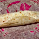 Taco Bell Cheesy Roll Up, unwrapped, actual size