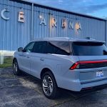 2025 Lincoln Navigator Reserve, rear 3/4 view, grey mist metallic