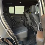 2025 Land Rover Defender 110 X-Dynamic SE in Silicon Silver, rear seat space, passenger room and comofrt,