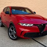 2025 Alfa Romeo Tonale Veloce in Alfa Rosso, red, front 3/4 view,