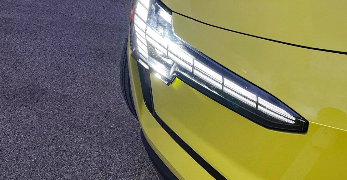 2025 Volvo EX30 in Moss Yellow, headlight detail,
