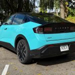 2026 Nissan Leaf in Seabreeze Blue Pearl, rear view, black wheels