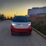 2025 Volkswagen ID. Buzz, Energetic Orange, Front view at sunset,