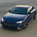 2025 Audi S5 in Ascari Blue, front 3/4 view, sunset