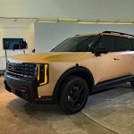 2027 Kia Telluride, front 3/4, clay color