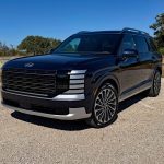 2026 Hyundai Palisade Hybrid Calligraphy, front 3/4, sunny