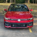 2025 Volkswagen Golf GTI SE in Kings Red, grille, front view,