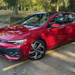 2025 Volkswagen Golf GTI SE in Kings Red, front view, front 3/4 view,