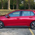 2025 Volkswagen Golf GTI SE in Kings Red, profile, side view,