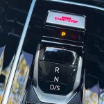 2025 Volkswagen Golf GTI SE in Kings Red, shifter, gear selector,