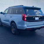 2025 Ford Expedition Tremor in Glacier Gray, rear 3/4 view,