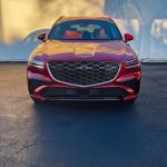 2026 Genesis GV70 Sport Prestige in Mauna Red, front end, grille,