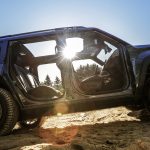 The all-new, all-electric, Trail Rated 2026 Jeep® Recon. Doors off, profile,