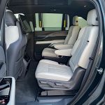 2025 Cadillac Escalade IQ Sport in Deep Space Metallic, 2nd-row seats, captains chairs,