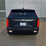2026 Cadillac Escalade IQ Sport in Deep Space Metallic, back end, rear view,