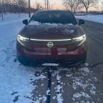 2026 Nissan Leaf Platinum+ in Coulis Red Pearl, front end, grille,