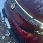 2026 Nissan Leaf Platinum+ in Coulis Red Pearl, front clip, grille detail,