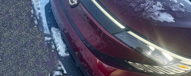 2026 Nissan Leaf Platinum+ in Coulis Red Pearl, front clip, grille detail,