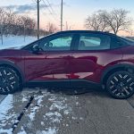 2026 Nissan Leaf Platinum+ in Coulis Red Pearl, profile view,