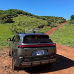 2026 Toyota bZ Woodland with all-terrain tires, rear view, desert,