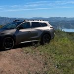 2026 Toyota bZ Woodland with all-terrain tires, front 3/4 view, desert,