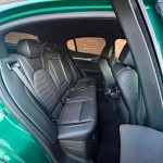 2025 Alfa Romeo Stelvio Intensa in Verde Fangio, rear seat, door opening, passenger space,