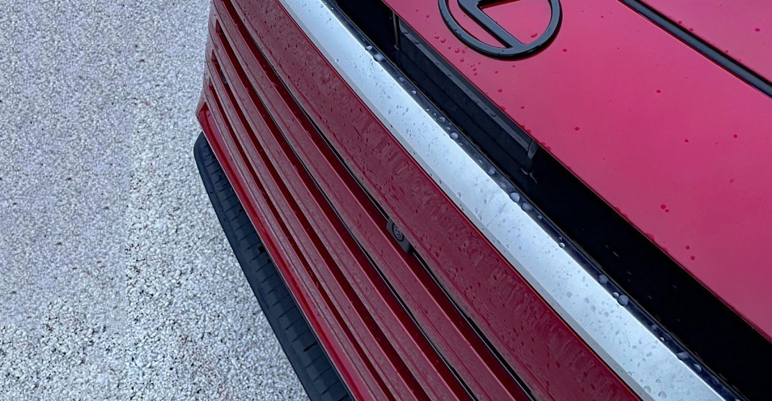 2026 Lexus TX 350 Luxury in Matador Red, grille detail, front clip,