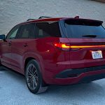 2026 Lexus TX 350 Luxury in Matador Red, rear 3/4 view