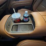 2026 Hyundai Palisade Hybrid Calligraphy in Cast Iron Brown, center console, drink holders,