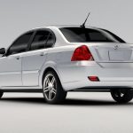 2012 Coda EV, white, rear 3/4 view,