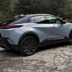 2026 Toyota C-HR XSE, rear 3/4 view, light blue