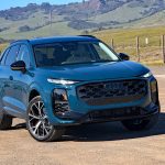 2026 Audi Q3 in Malpelo Blue, in mountains, wire fence,