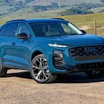 2026 Audi Q3 in Malpelo Blue, sunny day, front angle shot,