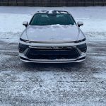 2026 Hyundai Sonata Hybrid Limited in Serenity White, front end, driving lights on,